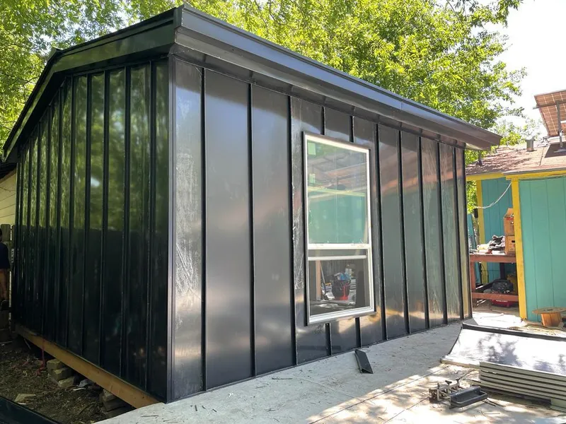 Black standing seam metal wall panels for Metal Roof Installation in Berlin