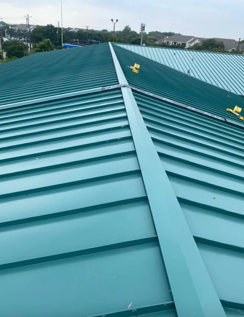 Green commercial metal roof ridge and valley for Metal Roof Repair in Berlin